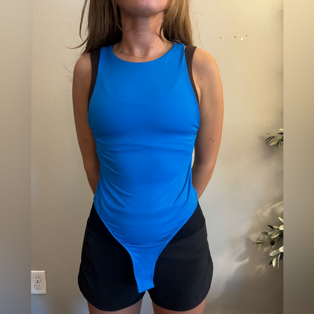 Bright blue bodysuit